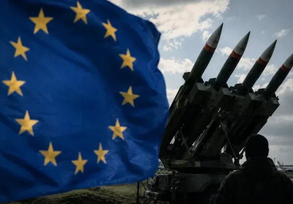 Прапор ЄС і пускова установка ракет PAC-3 для Patriot